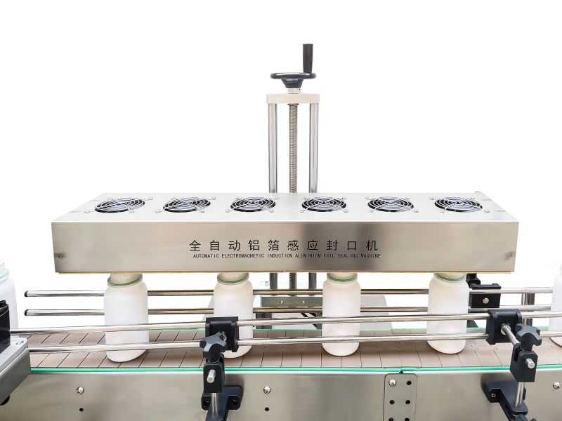 Aluminum foil sealing machine